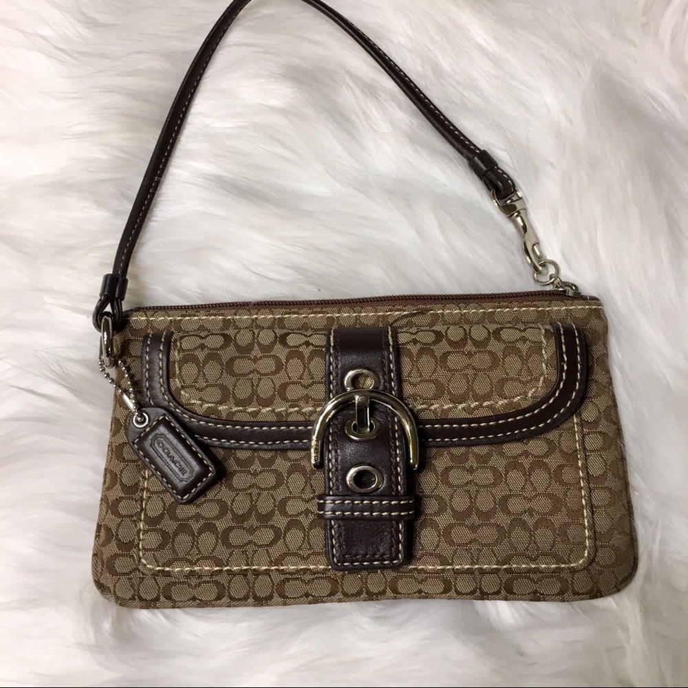 Coach canvas signature wristlet.